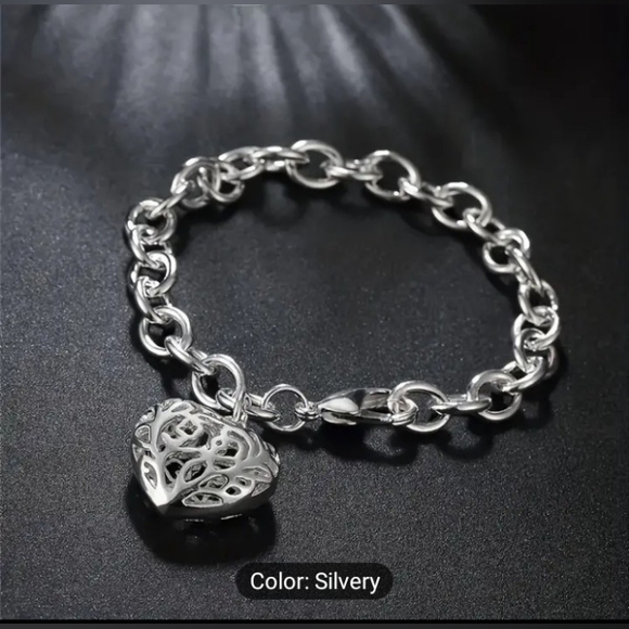 Jewelry - LOW START NWOT Stainless steel bracelet with heart charm